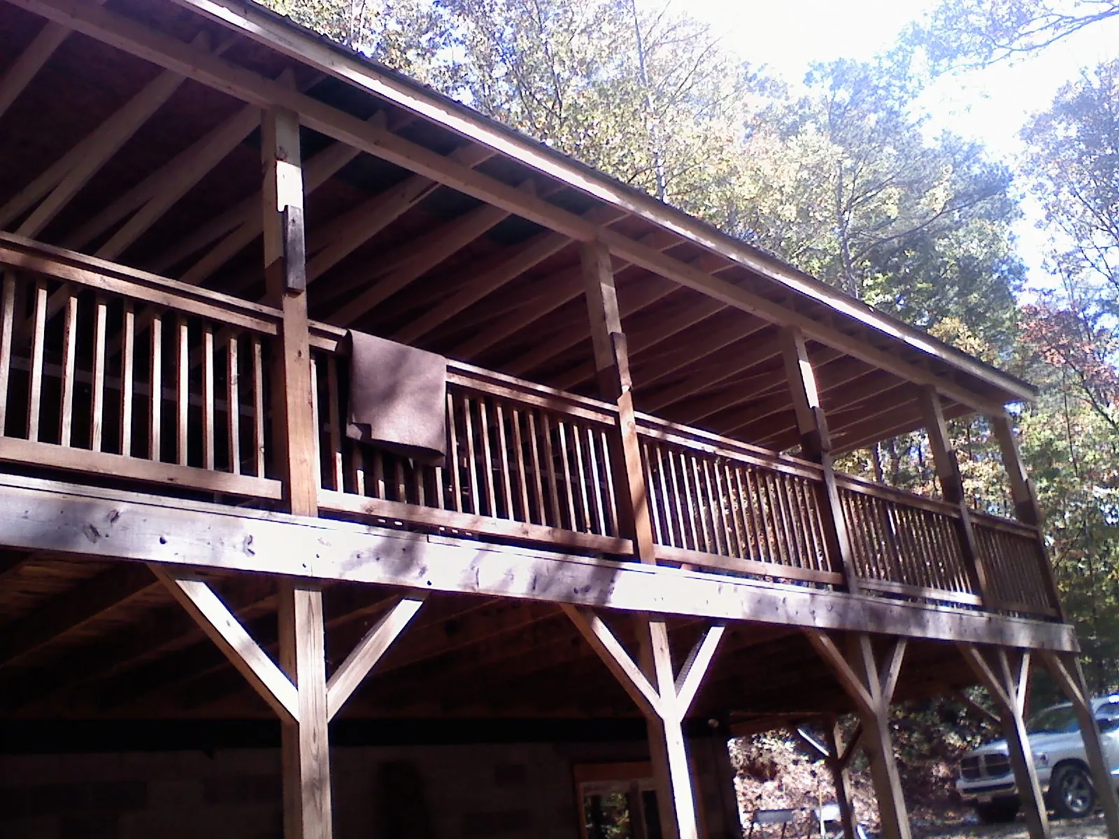 Timber framing under a new elevated porch and deck — Roof Leak Repair in Richford by Roofing Brothers